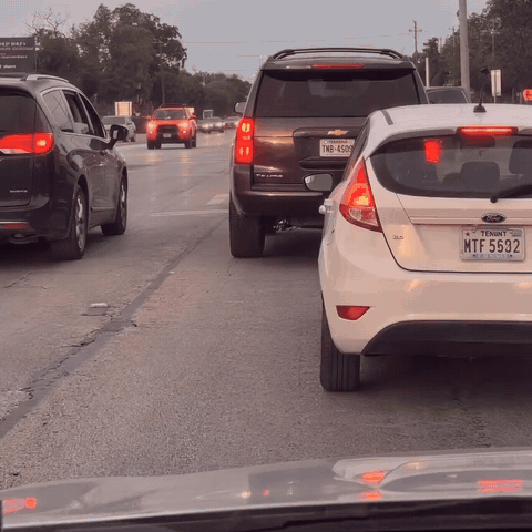Gag Hand LED sign in traffic
